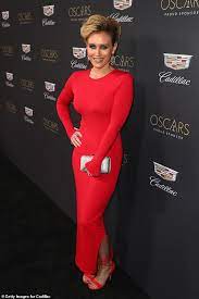 She teased a glimpse of her scarlet pedicure in black heels while adding an edgy twist with a padlock necklace. Nicky Whelan Steps Out In A Body Hugging Dress For The Cadillac Oscar Week Celebration Daily Mail Online