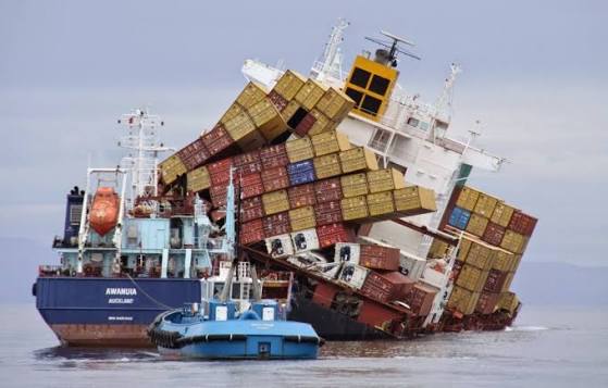 Large cargo ship sailing on the ocean, representing marine insurance for shipping and cargo.