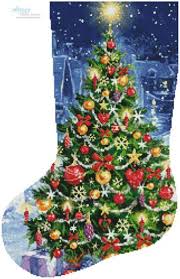 Here are a range of free cross stitch and embroidery patterns, all of which use dmc threads, which i suggest you have a look through. Christmas Tree Stocking Left Cross Stitch Pattern By Tereena Clarke Crosstitch Com Cross Stitch Christmas Stockings Cross Stitch Patterns Christmas Stocking Pattern Free