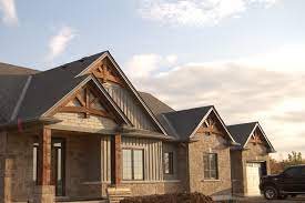 How far out can i hang the gable end truss? Gable Trusses Stoney Creek Rustic Exterior Toronto By Tfsinc Timber Frame Design And Construction Houzz