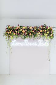 How To Make A Flower Photo Booth Backdrop With Fiftyflowers Com Diy Photo Booth Backdrop Photo Booth Backdrop Wedding Photo Booth Backdrop