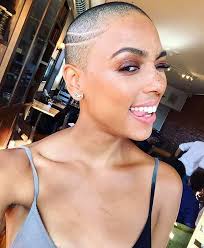 chrismiss_ is working this faded cut✂️ Sometimes less is more❤️  #voiceofhair #fade #undercut #taperedcut =…