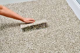 How to Repair a Carpet With Carpet Patching