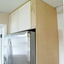 Lower cabinet, upper cabinets, countertop and a sink. How To Build A Diy Refrigerator Cabinet Chatfield Court