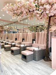She has coiffed the hair and painted the faces of numerous celebrities and founded glam squad production artist the one stop crew shop, in 2000. Pin By Dia On Spa Mani Y Pedi Nail Salon Interior Design Nail Salon Interior Salon Interior Design