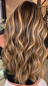 Fearless natural hair color that doesn't fade into the background! Cute Summer Hair Color Ideas 2021 Brown Hair With Hazelnut Accent Hair Colors