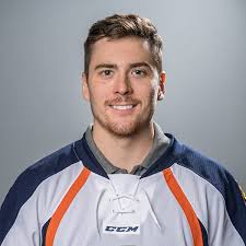 Allan McPherson signe au HCC