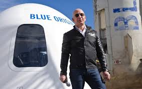 Jeff bezos's trip to space was actually a rivian ad in disguise here's why electric vehicles from rivian were featured so prominently in the blue origin launch the blue origin new shepard crew, including jeff bezos in a cowboy hat, next to rivian's r1s suv. Jeff Bezos Will Go To Space On Blue Origin S First Crewed Flight Scientific American