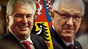 VOĽBA MEDZI DRSNOU AUTENTICKOSŤOU A DOKONALÝM MARKETINGOM Kým ešte pred  týždňom vyzeral byť Jiří Drahoš jasným favoritom druhého kola  prezidentských volieb v Česku, dnes to už tak nie je a Miloš Zeman