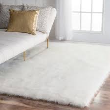 Black And White Sheepskin Rug Overstock Com Online Shopping Bedding Furniture Electronics Jewelry Clothing More White Rug Bedroom White Shag Rug Rugs In Living Room