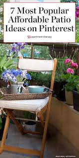 Colorful pots and ceramic side tables boost the patio's light and bright vibe. More People Are Looking For Ways To Improve Their Outdoor Spaces On A Budget Says Pinterest Small Patio Ideas On A Budget Small Patio Outdoor Spaces