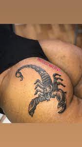 Scorpion butt tattoo