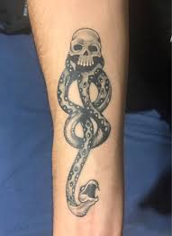 The idea of making a. The Dark Mark Lotus Tattoo In Hemet Ca Mark Mckenna Dark Mark Tattoos Mark Tattoo Tattoos