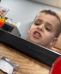 Novel activity, but usually aversive to “chewy things”, Easy option to spit  the gum, mirror for feedback, repetition, slow rate of work, and we chew  chew chew.