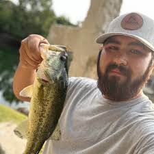 Will a mini jeep fit in a full size truck bed with a closed tailgate?