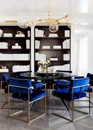 Round Black Dining Table With Royal Blue Velvet Dining Chairs Contemporary Den Library Office Dining Room Blue Dining Room Contemporary Luxury Dining Room