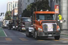 Whether you're the driver or someone helping at the job site, it's important that you make safety a priority whenever you're working around a dump truck. Truckers Protest California Gig Work Law That Could Make Them Employees