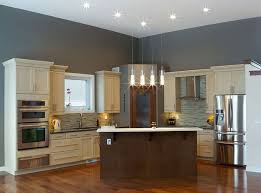 The grey tones in this kitchen go well with the white walls and dark granite countertops. 30 Gray And White Kitchen Ideas Designing Idea