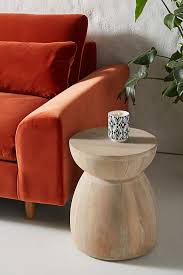 If neutrals and metallic accents feel too moody for your taste, bring in a playful throw pillow. Betania Side Table Anthropologie