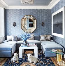 A custom sectional covered in a pindler linen, a cocktail table by nada debs, a striped chair by kelly behun studio, and a vintage tubular chair by joe colombo for flexform complete the look. 18 Creative Wall Coverings That Put Wallpaper Paint And Tile To Shame Architectural Digest