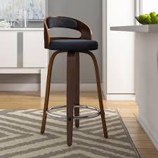 Ashwood 'fish hook' modern arm chair mounted on wooden frame and reinforced with solid supports. George Oliver Lacayo Mid Century Modern Low Back Bentwood Frame 24 Swivel Bar Stool Reviews Wayfair