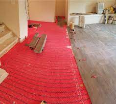 Instead of blowing hot air through a vent or pumping hot water to a baseboard radiator along the wall, radiant heat warms up the entire floor. Heated Basement Floor Systems And Cost Warmup Usa