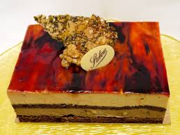 L Ambre Gateau Au Chocolat Noix Caramelisees Et Praline L Ambre The Amber Chocolate Caramelized Walnuts And Praline French Pastries Food Pastry Shop
