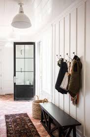 The Modern Farmhouse Mudroom Of Your Dreams By Studio Mcgee With racks for shoes, hooks for jackets. studio mcgee