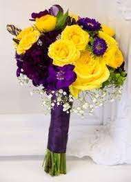 Purple silk decorates the handle of. 12 Purple Yellow Bouquet Ideas Yellow Bouquets Purple Wedding Wedding Flowers