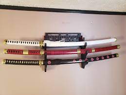 I Bought Zoro S Swords And They Re Legit Hand Forged Fully Sharpened Katanas I Have More Respect For Him Holding One In His Mouth They Re Way Heavier Than I Expected Lol R Onepiece
