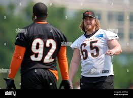 Cincinnati Bengals' Alex Cappa (65) speaks with BJ Hill (92) during  practice at the team's NFL football training facility, Tuesday, June 6,  2023, in Cincinnati. (AP Photo/Jeff Dean Stock Photo - Alamy