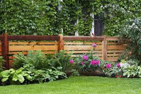 The split rail, or post and rail, fence is essentially a rustic version of a post and board fence style and is similarly a good choice for a decorative accent, for delineating areas, or for marking boundaries without creating a solid visual barrier. 20 Best Backyard Fence Ideas Privacy Fence Ideas For Backyards