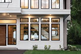 Porch with striking contrast and hanging baskets Wood Fiberglass Casement Windows Elevate Casement Marvin