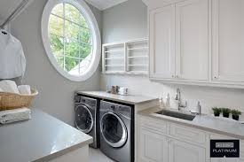 Laundry room cabinet with hanging rod. Laundry Rooms Jane Lockhart Design