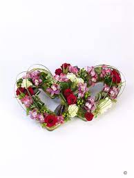 Loops of steel grass white calla lily complete this elegant design. Double Heart Tribute Mixed Funeral Flowers Halifax