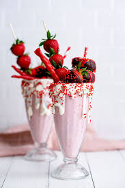 Amazing Strawberry Freakshakes Extreme Milkshakes Recipe With Donuts Chocolate Covered St Milkshake Recipes Chocolate Milkshake Chocolate Covered Strawberries