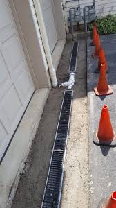 The best way to remove water from a catch basin is to use a drain pipe at least 4 in. Trench Drain Installation In Oradell James Kurpiel Inc
