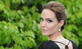 This tattoo at the base of her neck reads, 'know your rights' which is a title of a song made by her favorite band the clash. Angelina Jolie S Tattoos What Each One Means And Who Did Them