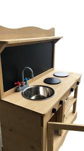 A mud kitchen is a childs kitchen set designed for outdoor use. Hide Seek Kids Mud Kitchen Outdoor Hideaway