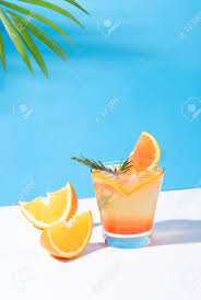 Last but certainly not least is the classic cut: Orange Punch Cocktail Cold And Refreshing With Orange Slice On Color Background Summer Drink Lizenzfreie Fotos Bilder Und Stock Fotografie Image 145724370