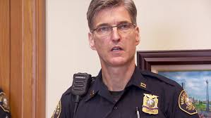 Portland police Chief Mike Marshman placed