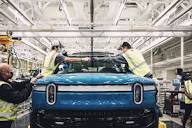 EV maker Rivian faces output, cost crunch in earnings report ...