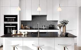 The kitchen island features a charcoal quartz countertop. 12 Black Quartz Countertops Ideas For Kitchen Counter