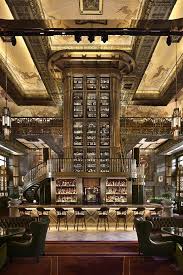 Room Art Deco Inspired Atlas Bar Features A Towering Central Liquor Tower That Reaches The Ceiling Located In The Parkview Square Building In Singapore 120 Bar Design Restaurant Lobby Bar Restaurant Design