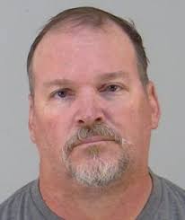 Bank customer arrested after allegedly pounding ATM with hammer