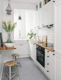 The abundance of white color in the interior is presumed to be scandinavian style. 25 Beautiful Scandinavian Kitchen Designs Decor Around The World Kitchen Design Small Small Kitchen Decor Tiny House Kitchen