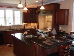 The colour or stain on the cabinetry has to assignment in bike with the… Uba Tuba Granite Countertops Pictures Cost Pros Cons