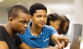 THE HISTORY, CURRENT USE, AND IMPACT OF ENTRANCE AND LICENSURE EXAMINATIONS  CUT SCORES ON THE TEACHER-OF-COLOR PIPELINE: A STR