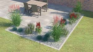 Ein Blumenbeet Vor Einem Haus Terrasse Umrandung Gartendekoration Gartengestaltung