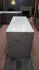 Qstone Statuary Classique Kitchen Island W Waterfall End Panel Msiqstone Statuaryclassique Quartz Interior Design Classes Quartz Kitchen White Countertops
